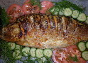 рецепт Вкусный карпик, запеченный в духовке