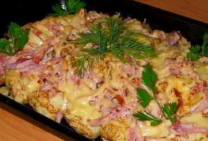 Фаршированные блины, запеченные под сыром